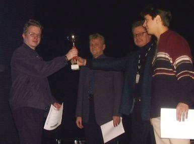 Ari Kavonius receiving the first prize